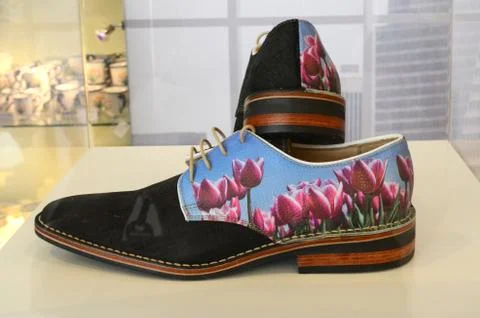 Custom stylish shoes with a tulip pattern Stock Photos