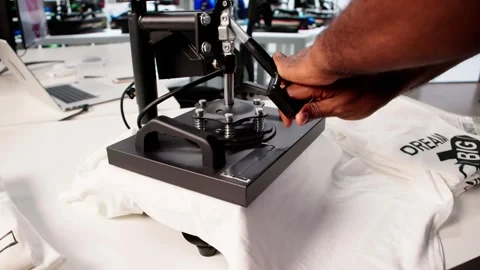 Custom T-Shirt Printing Workshop: Heat Press Video stock 321158280