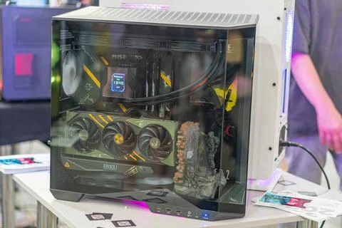 Custom, tall, transparent computer tower with LED lighting on a white platf.. Stock Photos