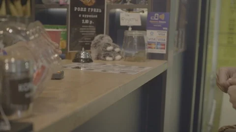 Customer buying cofee at cafe using credit card contactless payment service Video stock 119934691