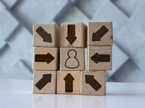 Customer centric concept with cubes, figure and arrows on them. Stock Photos