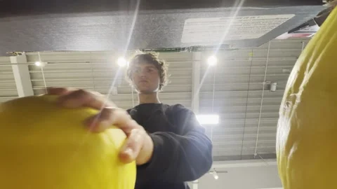 Customer chooses a fresh melon while shopping in a supermarket Stock Footage 339321530