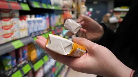 A customer chooses soap in a store. Stock Footage 270486146