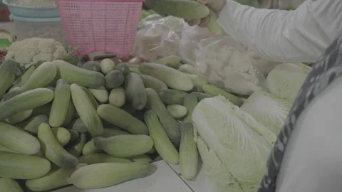 Customer Choosing Fresh Cucumbers at Traditional Market Slog3 10 bit 4:2:2 Stock-Footage 340183810