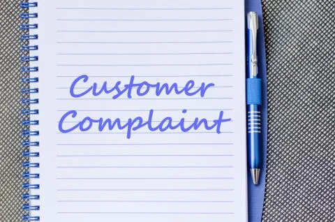 Customer complaint write on notebook Stock Photos