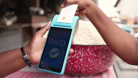 Customer Credit Card Payment via Blue POS Terminal at Outdoor Market Video stock 346228882