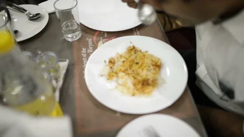 Customer eats Hyderabad Biryani Stock Footage 86837305