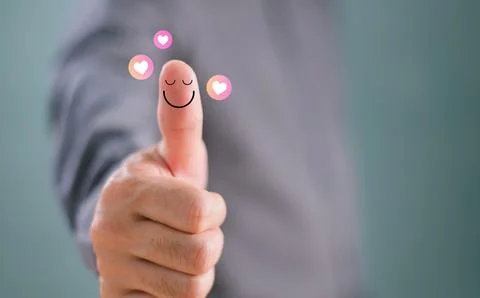 Customer experience compliment concept. Thumb up happy smile face, good feedb Stock Photos