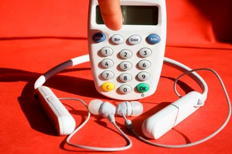 Customer is going to press the login button on a bank e-card reader machine f Stock Photos