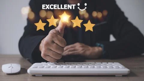 Customer hand with gold five star rating feedback icon and press level exce.. Stock Photos