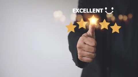 Customer hand with gold five star rating feedback icon and press level exce.. Stock Photos