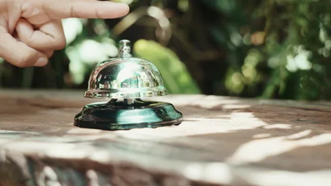 Customer hand ringing service bell at coffee cafe shop for calling the staff Stock Footage 222033145