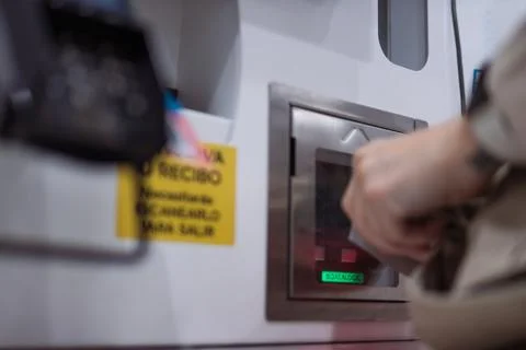 Customer hand scanning an item at a self-service checkout terminal, streaml.. Stock Photos
