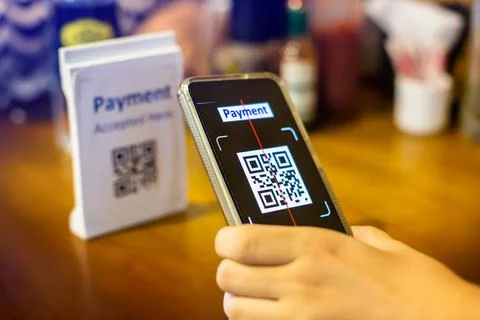Customer hand using smart phone to scan QR code Tag to accepted generate digi Stock Photos