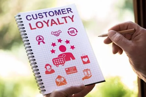Customer loyalty concept on a notepad Stock Photos