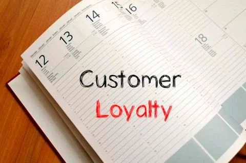 Customer loyalty write on notebook Stock Photos