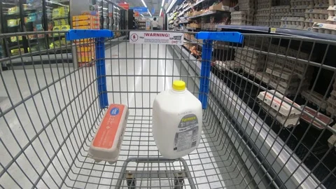 Customer making daily needs basic assorted groceries shopping at Groceries store Video stock 201885242