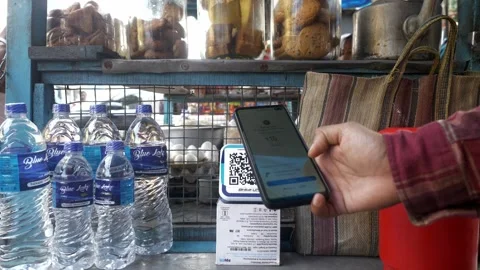 Customer making fast UPI digital payments scanning Paytm QR codes, Paytm Stock Footage 295853800