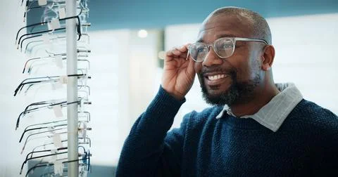 Customer, optometry or happy black man with glasses in store for frame opti.. Stock Photos