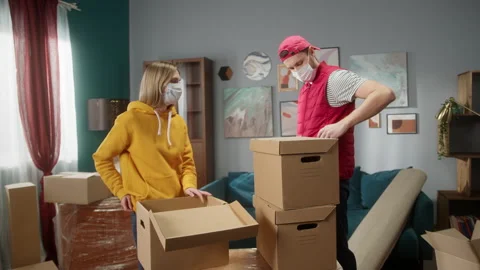 Customer paying to delivery man using NFC technology with phone and credit card Stock Footage 149679216