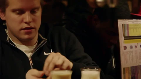 Customer Paying for Freshly Poured Draft Beers In Crowded Bar Stock-Footage 344104058