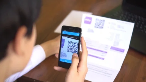 Customer pays bill with QR code and smartphone mobile app Stock Footage 118956332