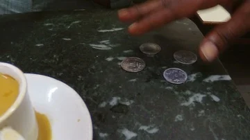Customer pays in coins Stock Footage 86004345