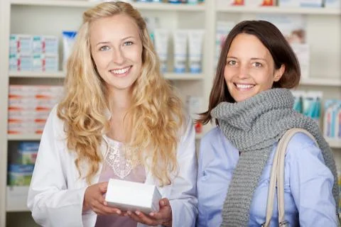 Customer with a pharmacist Stock Photos
