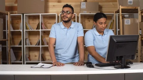 Customer Picking up Parcel at Post Office Stock Footage 114212709