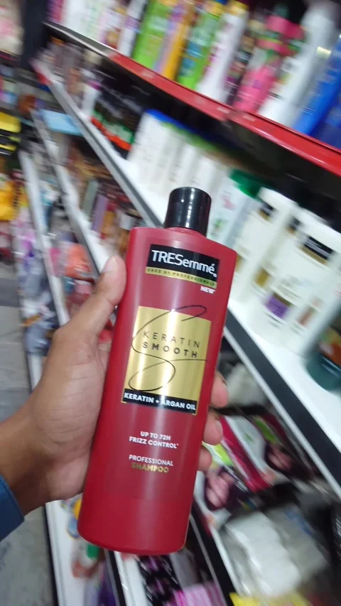 Customer Picking Up TRESemme Shampoo From Store Shelf: Sibi, Pakistan 1 Sep 2026 Stock Footage 344291203