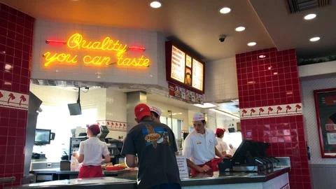 A customer placing his order at the IN-N-Out Restaurant in Newport Beach, Video stock 108602915