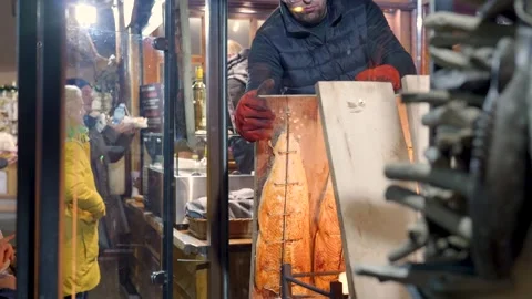 Customer Points At Meat Selection, Evening Market Scene With Lively Crowd And Stock Footage 328047824
