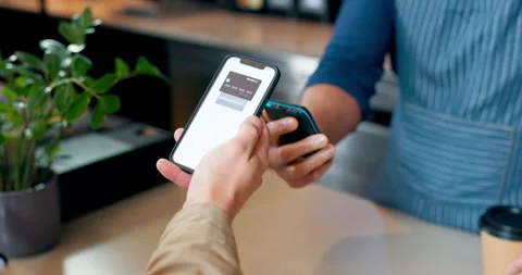 Customer, pos machine and phone for payment, coffee or tap transaction in Stock Footage 252275020