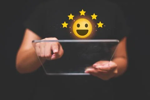 Customer pressing satisfaction with gold five star rating feedback icon and.. Stock Photos