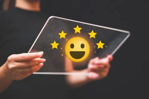 Customer pressing satisfaction with gold five star rating feedback icon and.. Stock Photos