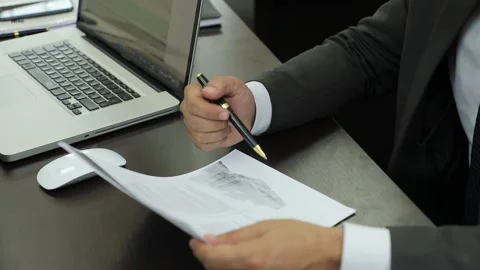 The customer puts his signature on the document Video stock 160509367