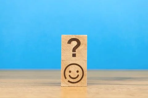 Customer with question mark. Support concept. Wooden cube with icons. Busines Stock Photos