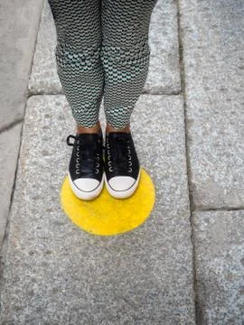 Customer queueing at safe distance and floor markings Stock Photos