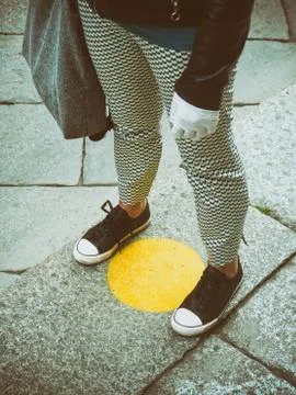 Customer queueing at safe distance and floor markings Stock Photos