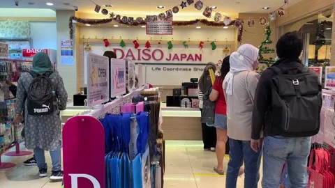 Customer Queues in Front of Daiso Japan Payment Counter Stock Footage 228262478