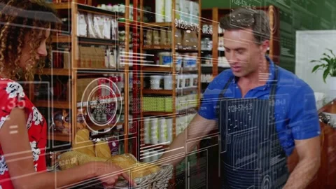 Customer reaching into bread basket, baker presenting loaf and bagging order Stock Footage 333034690