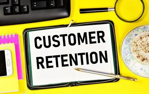 Customer retention. Text label in the planning notebook. Stock Photos