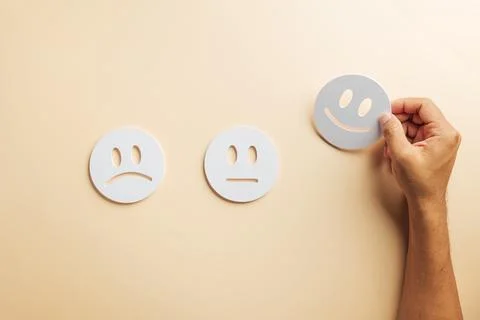 Customer satisfaction concept guides choice, hand selects happy face feedba.. Stock Photos