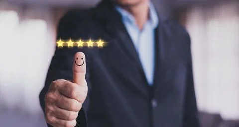 Customer satisfaction concept. Hand with thumb up Positive emotion smiley fac Stock Photos