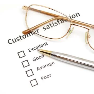 Customer satisfaction survey form with pen and eye glasses Stock Photos