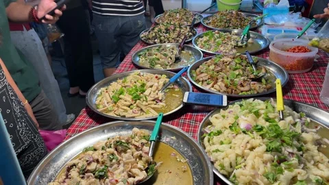 Customer scan QR code to pay for food at Tao Poon Fresh Local Market Stock Footage 172367154