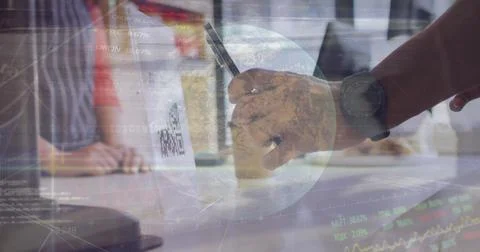 Customer scanning QR code with smartphone in retail counter area, with globe 写真素材