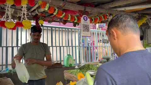 Customer scans a QR code and makes payment in Mumbai via UPI digital channel Video stock 307381502