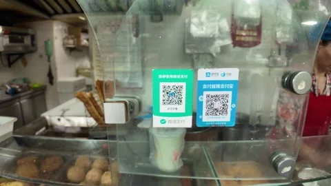 Customer Scans QR Code to Pay at Shanghai Breakfast Shop Stock Footage 340176615
