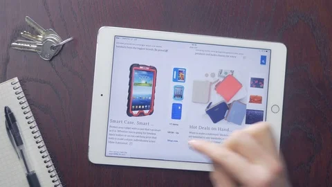 Customer searching for items on Ebay website on his iPad Stock Footage 75460629